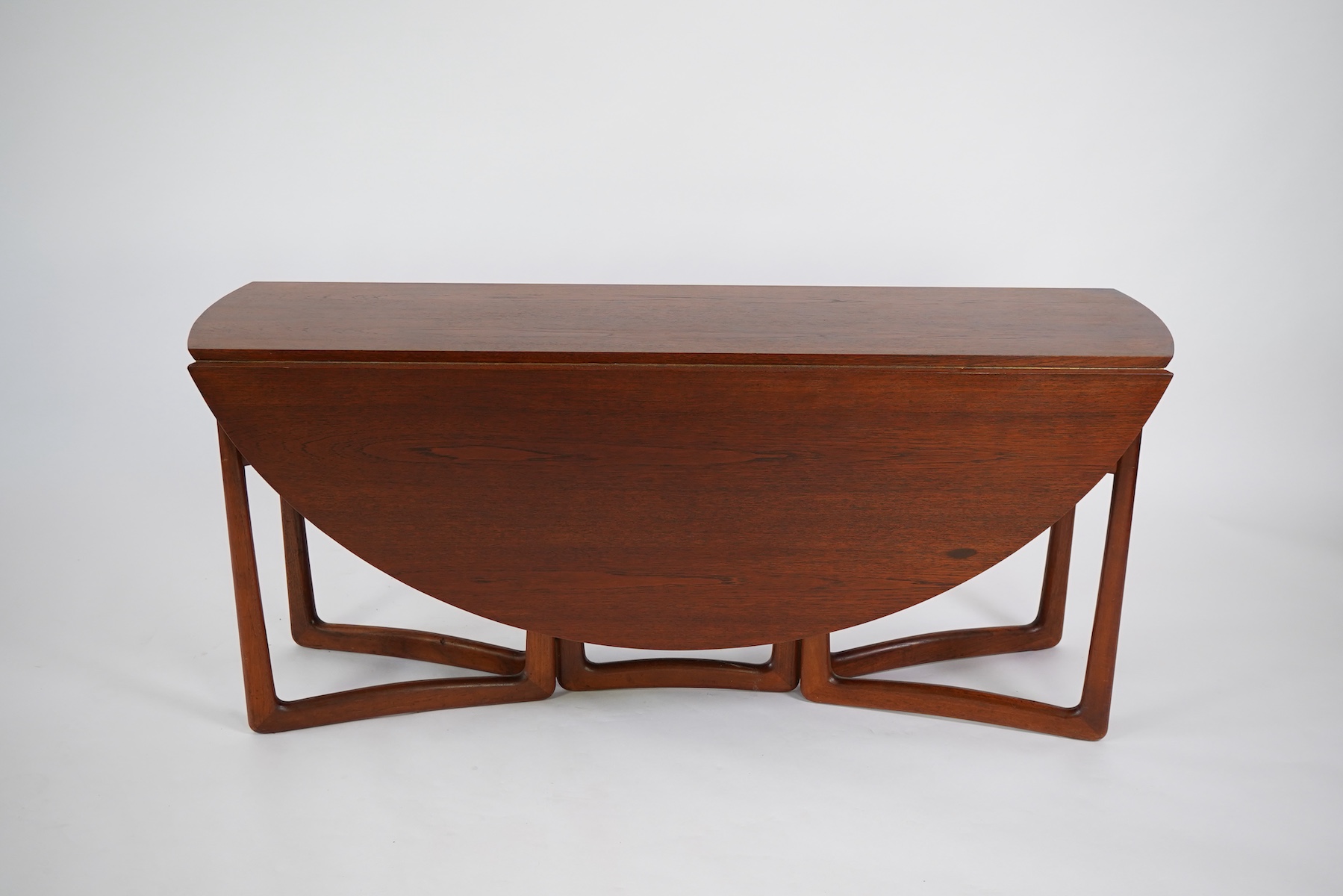 Peter Hvidt (Danish, 1916–1986) and Orla Mølgaard-Nielsen (Danish, 1907–1993) for France & Søn: A Model No. 20/59 teak drop leaf dining table